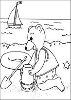 coloriage petit ours brun fait un chateau de sable